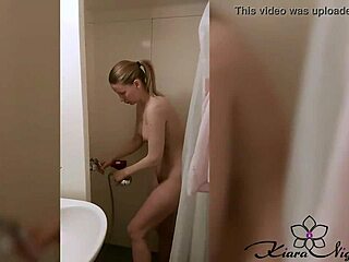 Masturbating blonde babe in the shower