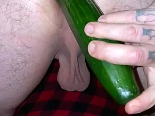 Huge cucumber penetrates tight ass