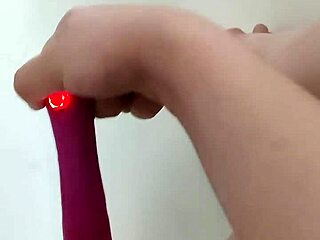 Vibrator play in the tub leads to a satisfying orgasm