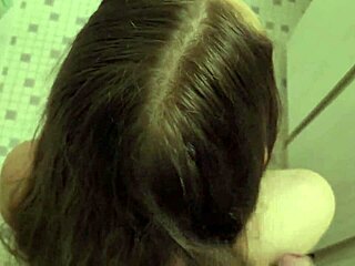 Brunette wife gets a cumshot in her hair and brushes it through