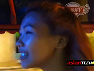 A petite Asian teen indulges in sextourism by giving a prostitute blowjob in a budget hotel