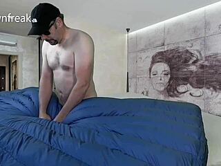 Wild humping on a down comforter with a cumshot