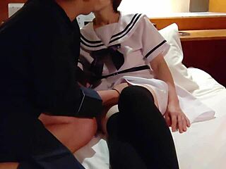Amateur Asian girl in sailor suit receives oral pleasure and creampie in erotic photoshoot